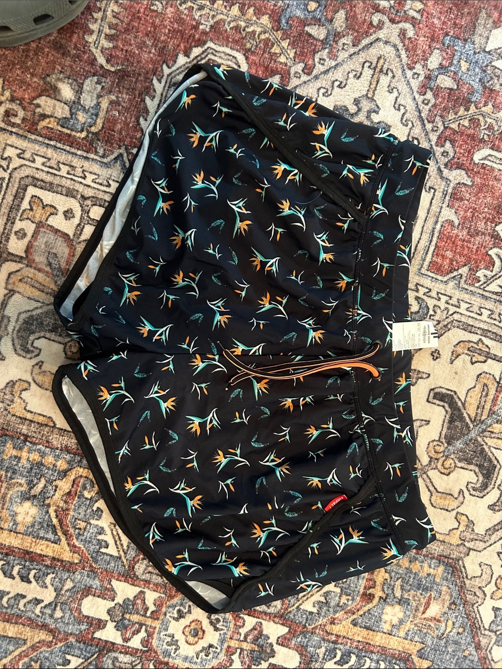 Pact Black Athletic Shorts with Orange and Teal Floral Print